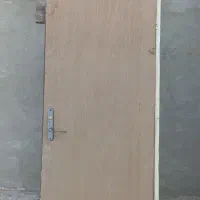 درب چوبی همراه با چهاچوب فلزی