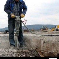 تخریب کاری کلی وجزی تراشیدن گچ وسیمان و کاشی