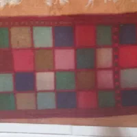 یک عدد قالی به ابعاد 1/60طول عرض 60 سانتی متر