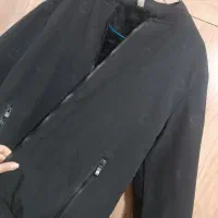 کاپشن|لباس|مشهد, مقدم|دیوار