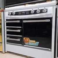 اجاق گاز طرح فر شیشه استیل 2و4درب ارسال چدن