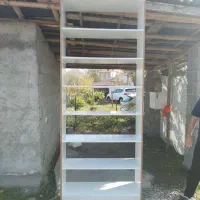 یکسری لوازم چوبی|کتابخانه، شلف، قفسه‌های دیواری|سنگر, |دیوار