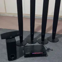 اسپیکر به همراه دستگاه دی وی دی ال جی فلش خور