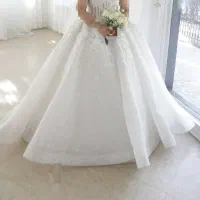 لباس عروس مزون دوز