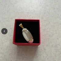 انگشتر و آویز گردنی