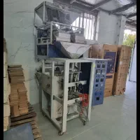 دستگاه بسته بندی دوتوزین گرانولی