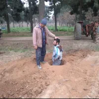 چاله کنی با تراکتور