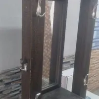 جاکفشی آینه دارباآویزلباس.جنسش ازدرخت جنگلی هست