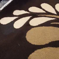 گلیم فرش کارکرده.چندجاسوخته.