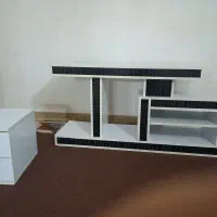 گوشی (میز زیر تلویزیون تصویر دوم را ببین)