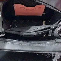 کیف دوشی|کیف، کفش، کمربند|قم, چهل درخت‎|دیوار