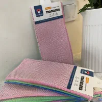 دستمال اشپزخانه و ظرف روغن فرچه دار