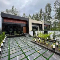 فلت-با-حیاط-سرسبز-و-ویو-ابدی