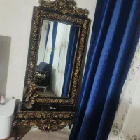 ساعت و آینه و کنسول