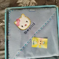 حوله کلاه دار نوزاد