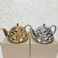 قوری طلایی و نقره ای چینی