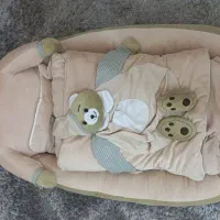 مبل نوزاد و قنداق و پتو و بالش فرم دهی سر نوزاد