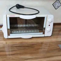 آون تستر مارک sunny اصل تایمر دار پخت کیک و غذا