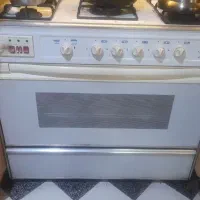 اجاق گاز فردار و جوجه گردان و استند قابلمه