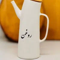 کتری، روغن ریز، جوراب، چنگال ظرف فریزر، بشقاب چوب|آب‌چکان و نظم‌دهنده ظروف|آفتاب, |دیوار