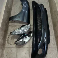 سپر جلو 206 و جفت چراغ جلو و گلگیر سمت چپ 206