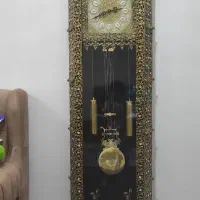 ساعت برنز اسیتاده