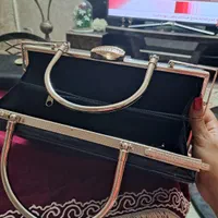 ساعت دیواری گل مصنوعی کیف مجلسی