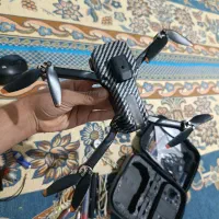 هلی شات دوربین دار|دوربین عکاسی و فیلم‌برداری|شیراز, گل سرخ|دیوار