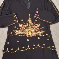 مانتو ترک|لباس|تربت‌حیدریه, مظفریه|دیوار