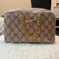 کیف رو دوشی زنجیر دار دو زیپه طلایی دارای بند بلند