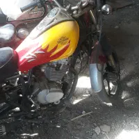 دو عدد موتور سیکلت  یکی هالی ۱۲۵ و یکی آمیکو ۷۰