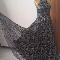 لباس مجلسی پارچه شاین و مروارید مشکی پانچ شده