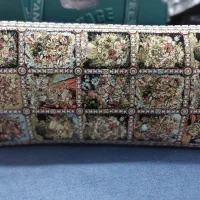 پشتی قالینی