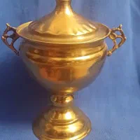 جام برنجی و تقویم ۲۰ ساله