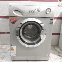 ماشین لباسشویی اسنوا سیلوردرب استیل باارسال و نصب