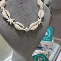 گردنبند و دستبند صدفی