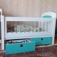 تخت خواب کودک که همزمان به گهواره نیز تغییر میکند|تخت و صندلی بچه|اردبیل, |دیوار