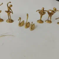 عروسک و قو برنجی