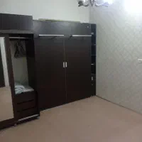 تخت تاشو دیواری با کمد لباس