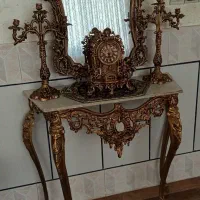 اینه شمعدان وساعت