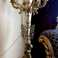 لوستر ۷ شاخه برنز کنار سالنی