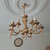 لوستر تمیز با روکش آب طلا