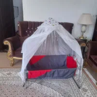 گهواره با عروسکا