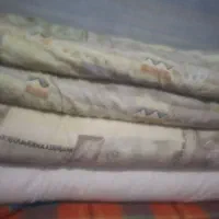 دوعددلحاف کارکرده .دوعدد پتو. تشک دونفره پنبه.|رختخواب، بالش، پتو|گرمسار, |دیوار