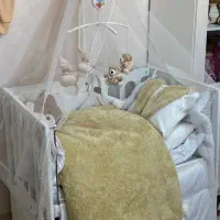 تخت گهواره ای،کالسکه مسافرتی