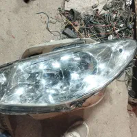 چراغ استوک ۲۰۶ درحد نو