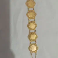 دستبند و ربع سکه