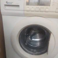 ماشین لباسشویی اسنوا  7 k خشک کن دارد سالم