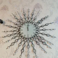 ساعت دیواری طرح خورشیدی