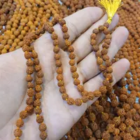 تسبیح ریسه رودراکشا انرژی درمانی یوگا|بدلیجات|مشهد, حرم مطهر رضوی|دیوار
